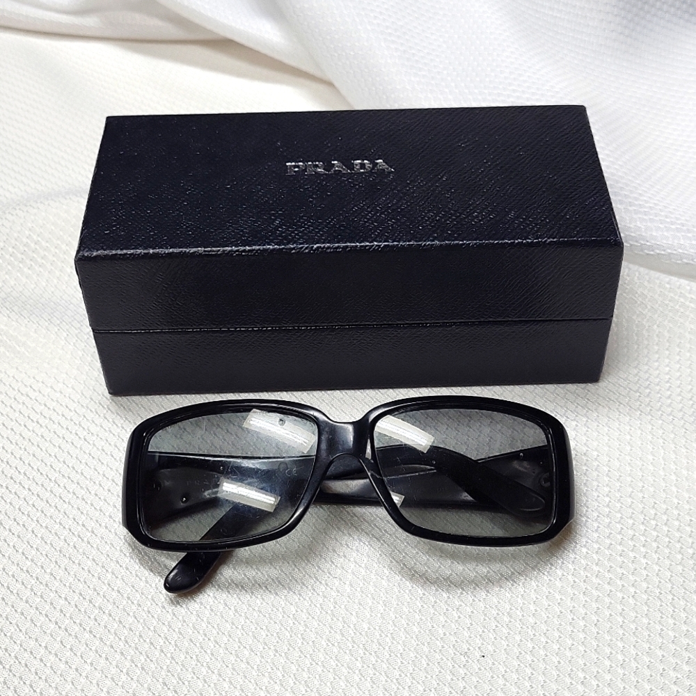 IN SEARCH OF PRADA SUNGLASSES